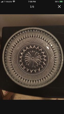 LARGE CUT GLASS BOWL WITH SILVER TOP WHICH HOLD SMALLER CUT GLASS BOWL