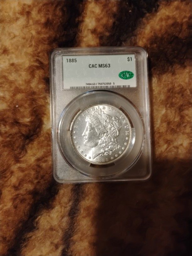 1885 MORGAN SILVER DOLLAR MS63 CAC CERTIFIED