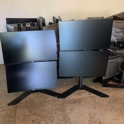 A Dual monitor stand with Two 24 inch Monitors