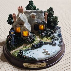 Thomas Kinkade “Everetts’s Cottage” Lighted Cottage Village Collectible Avon / *New Old Stock / Measures: 3.5" H / **REQ. (2) AA Batteries - NOT INCLD