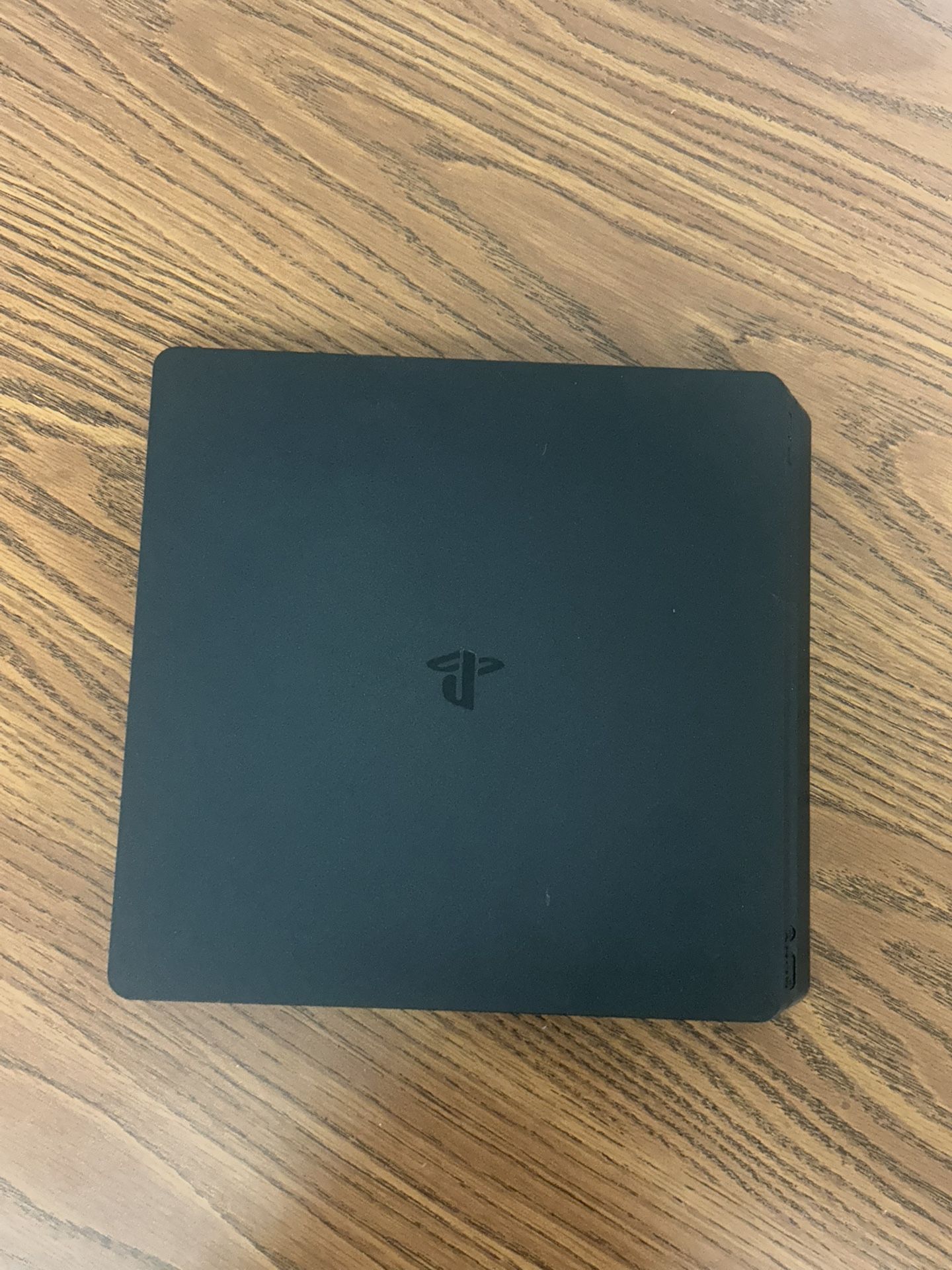 Selling a PS4 Slim 1TB console in great working condition.