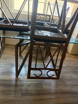 Glass Top Dining Table with Metal Chairs