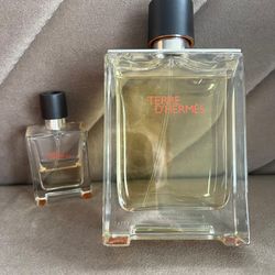 Selling Hermès Terre d’Hermès Parfum 6.7oz (Brand New) + Free half used mini travel bottle included