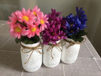 Distressed mason jar vases with silk flowers $15 for all 3
