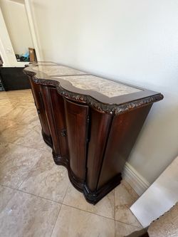 Oversized wood credenza with granite counter
