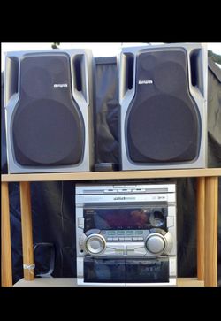 Stereo System Amplifier CD Player Cassette Player Radio Remote Control Speakers