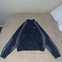 Nocta X Nike Wind Breaker Top 