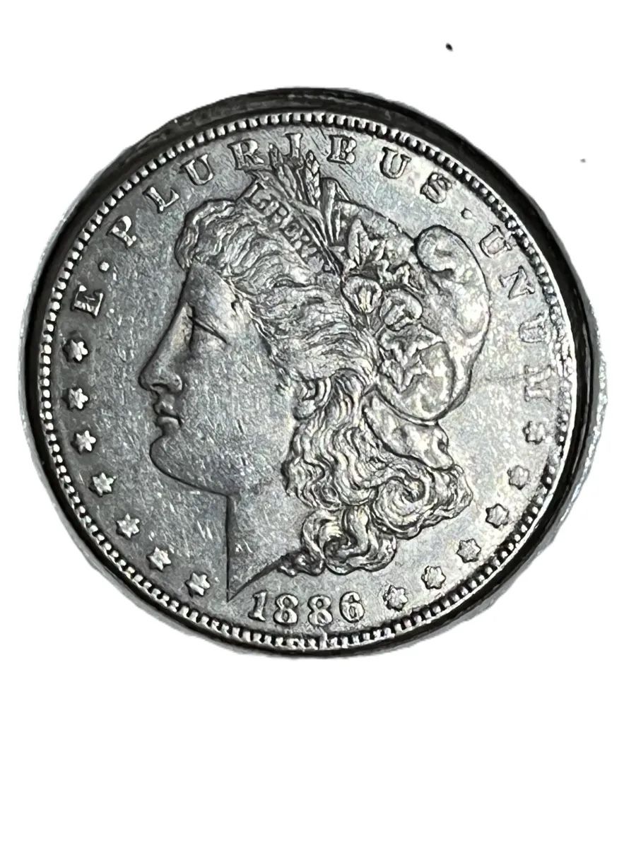 1886-O Morgan Silver Dollar 7 Tail Variety Mint State