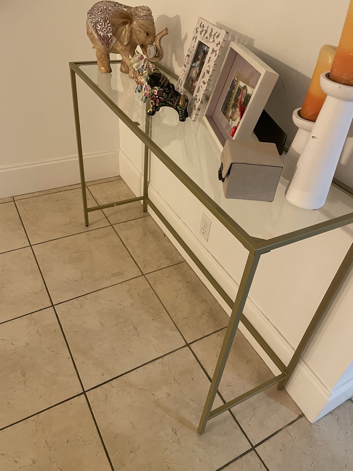 glass and gold entry table