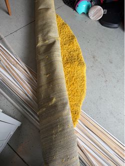 Round yellow rug