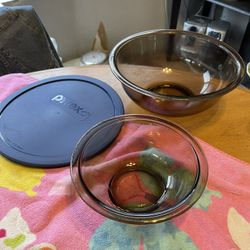 pyrex vintage Smokey bowls. 7” and 10” with fitting lid. Some wear. No chips or cracks. Rochester wa