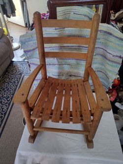 Vintage wood ladder back kids  rocking chair .