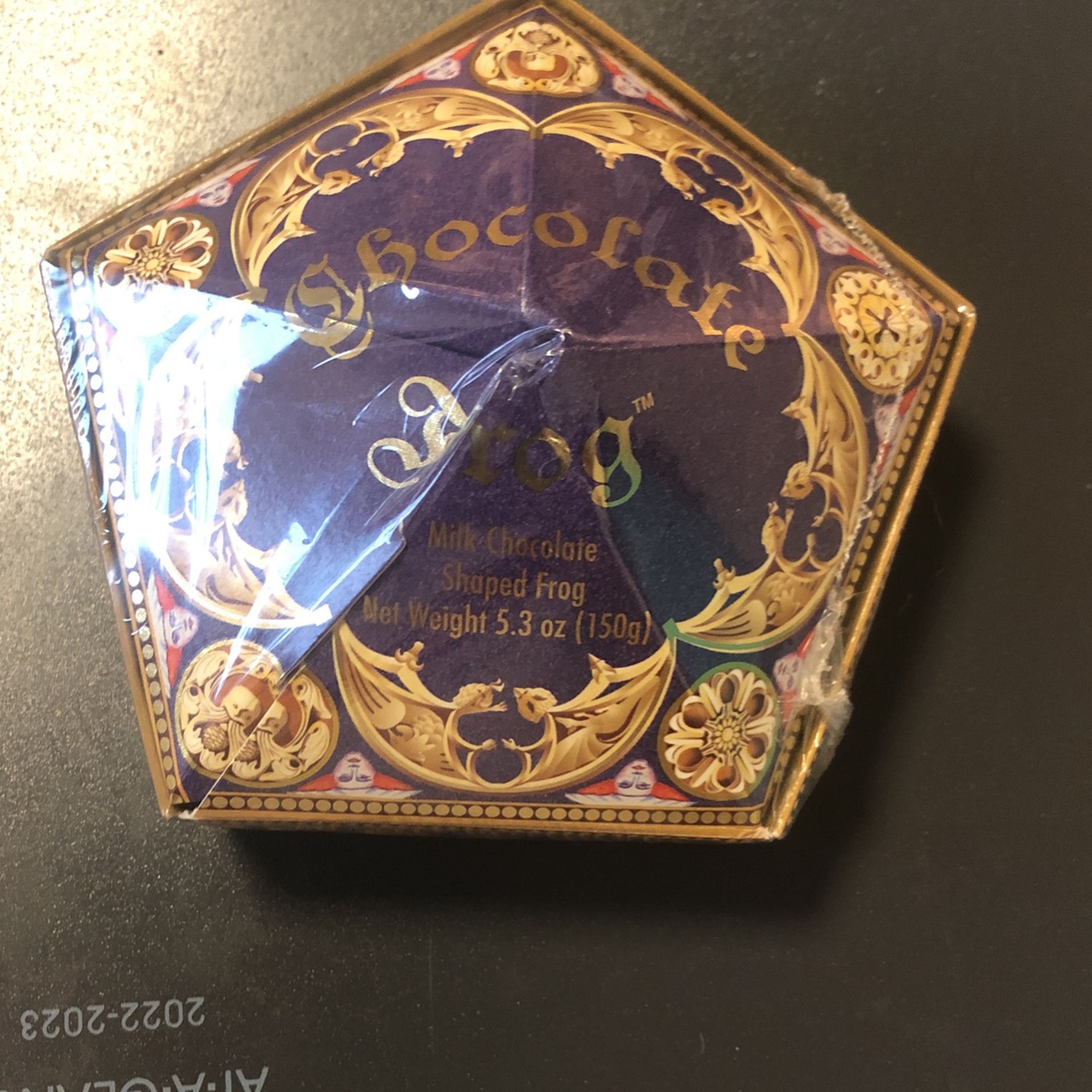 Harry Potter wizard in world at universal milk chocolate shaped frog with one harry potter card