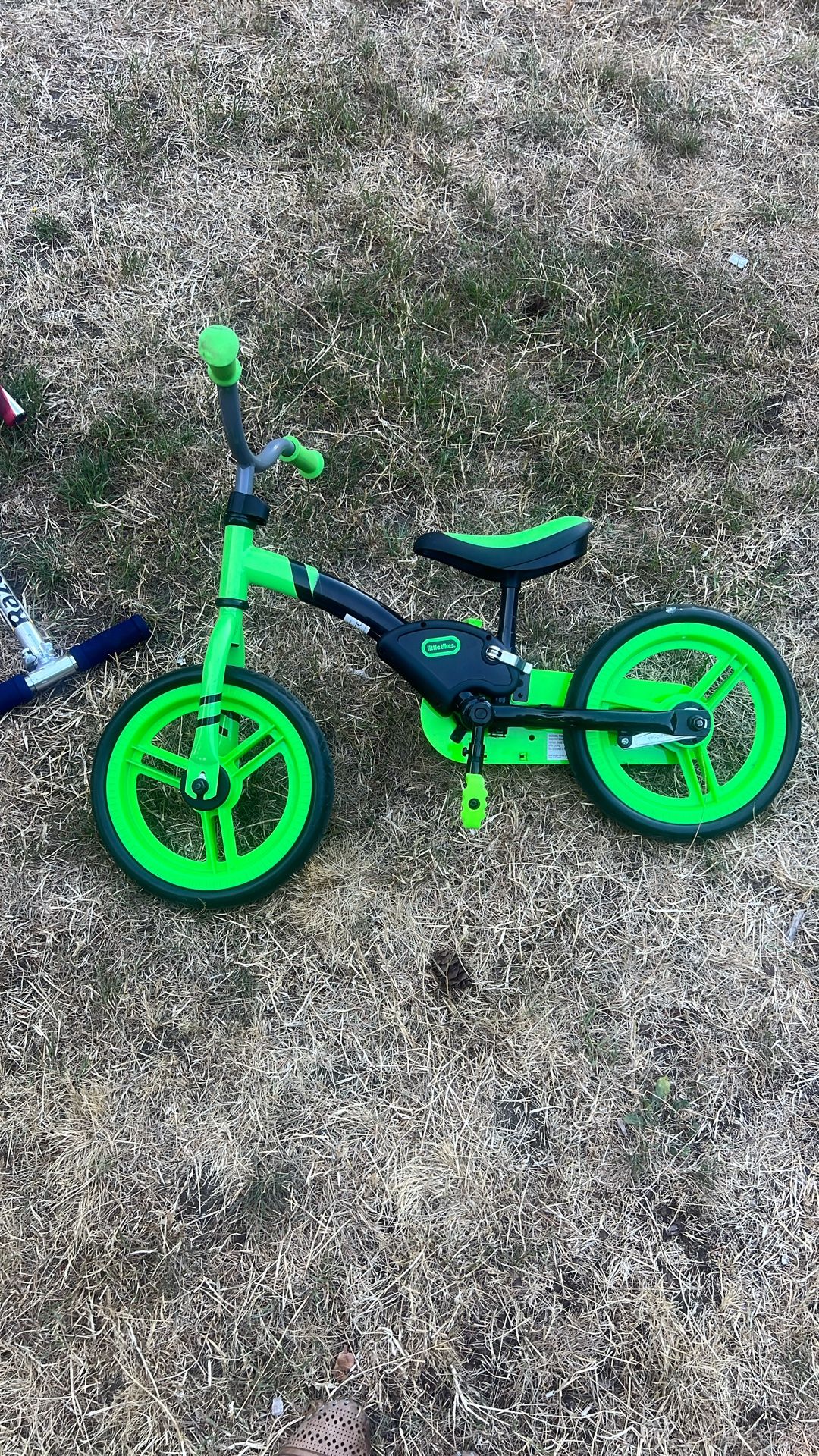 little tikes neon green toddeler balancing  bike 