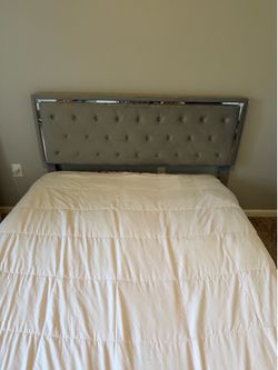 Grey queen sized bed
