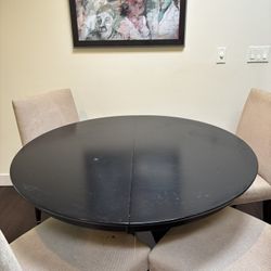 Free 48 inch round black table 