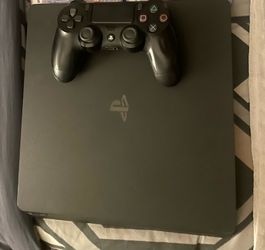 PS4 Slim Console with Controller and 2 Games