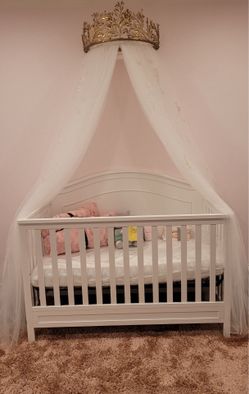4-in-1 convertible crib and mattress