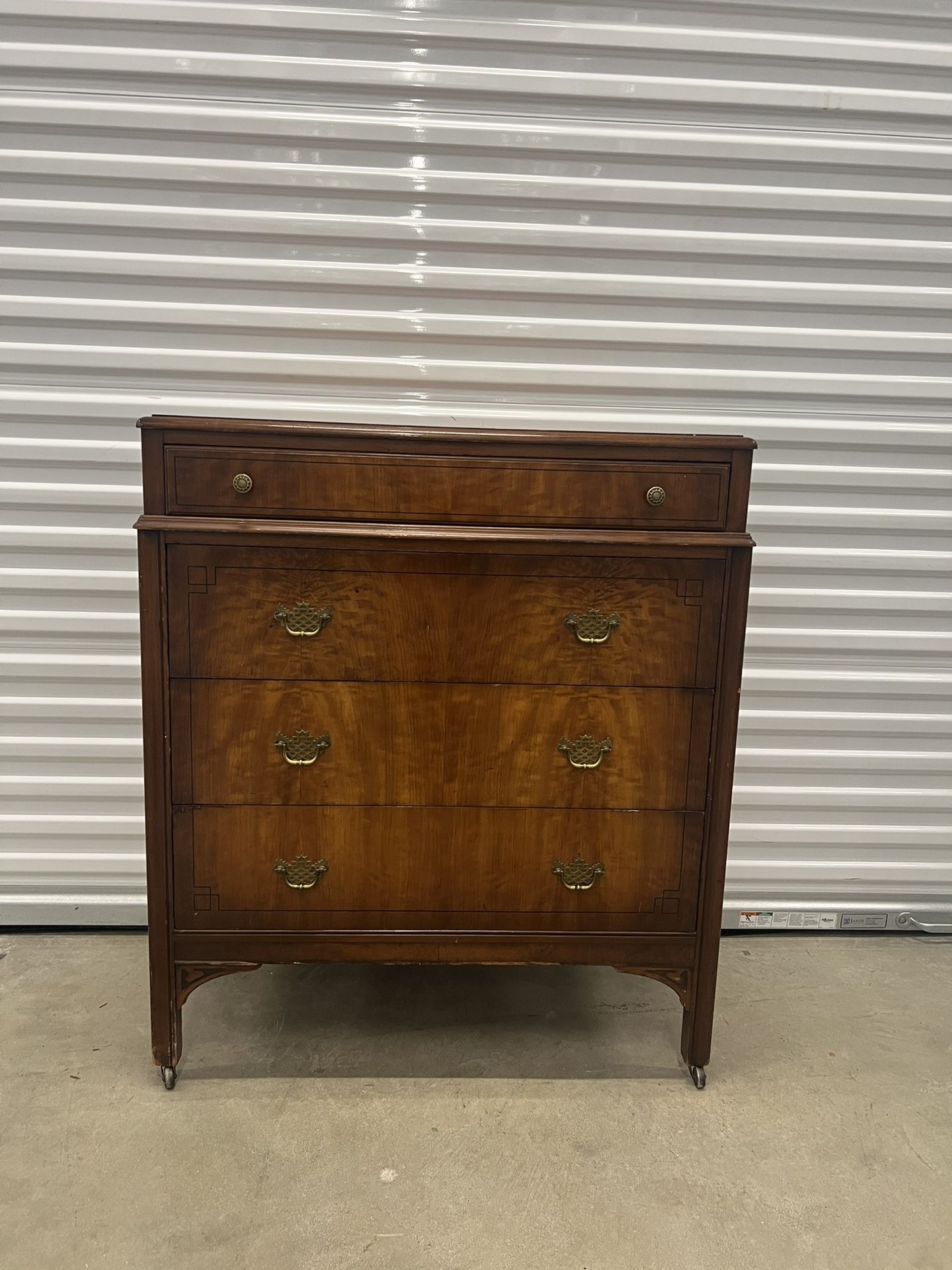 Antique Dresser rolls on casters