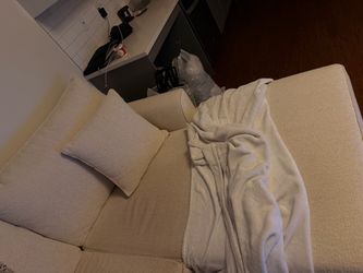 Living Spaces Cream Sectional Sofa with Chaise Pillows Included