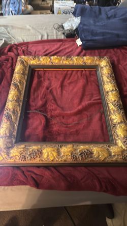 Vintage baroque, revival style piece featuring gold, guilt, leaf, and grape motifs