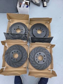 2003 to 2007 Cadillac CTS front and rear hi performance brake rotors. NEW