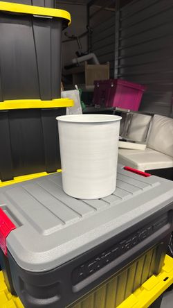 Small white trash can