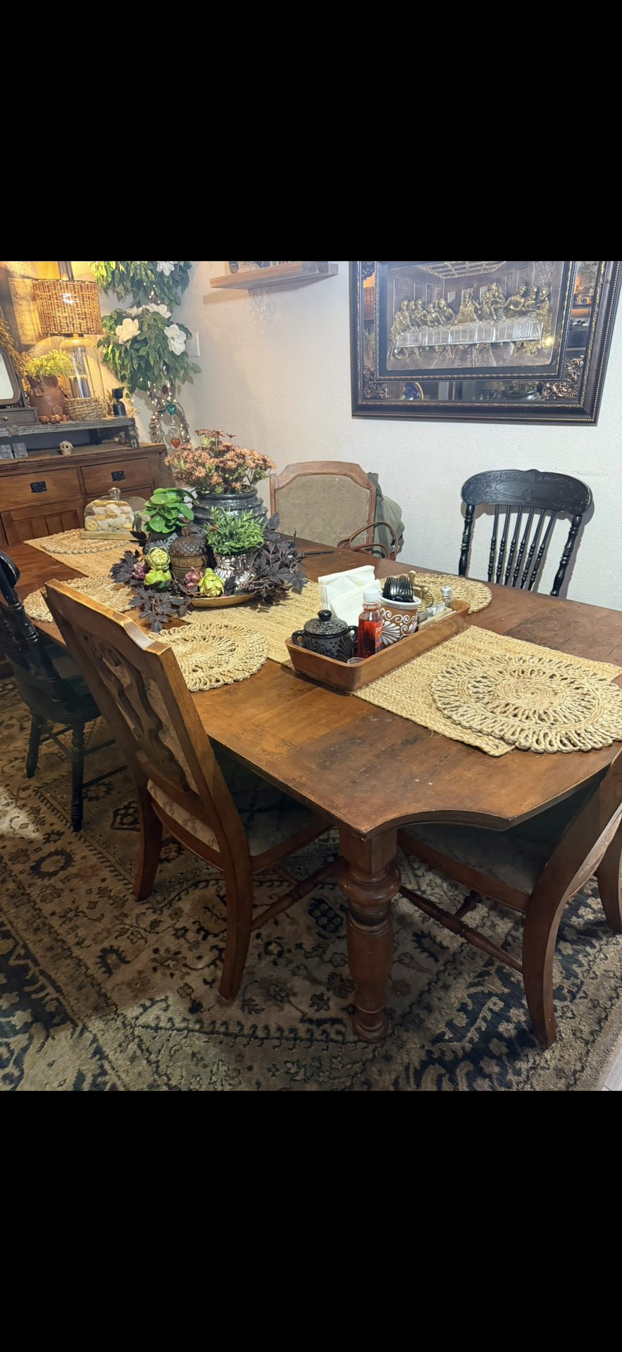 Dinning table can be smaller or large has 4 brown chairs and 2 black has some wear see pictures