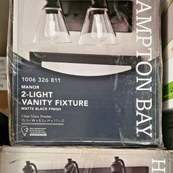 Hampton Bay Manor 15.3 in. 2-Light Matte Black Industrial Bathroom Vanity Light with Clear Glass Shades
