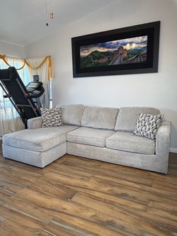 Gray Living Spaces Sectional Sofa with Chaise