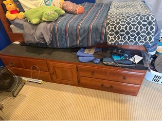 Real wood storage bed.