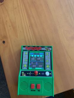 Hand held frogger game
