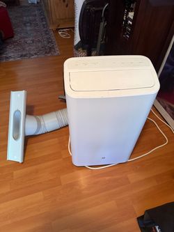GE portable AC unit -barely used for sake