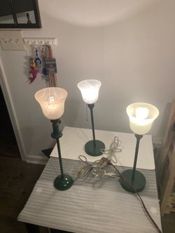 Set of beautiful stainless steel hunter green lamps