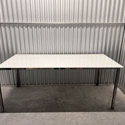 Glass/Metal Table With White Coating Underneath 