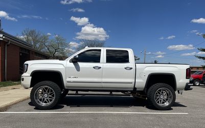 Hostile Sprocket 22x12 (6x5.5-6x139.7) GMC CHEVY 1500 Wheels with RDR M/T Tires 35x12.5x22. OBO