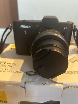Nikon 1 V1 Mirrorless Digital Camera – Complete Bundle