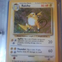 Raichu Unlimited 1st Edition Holo 