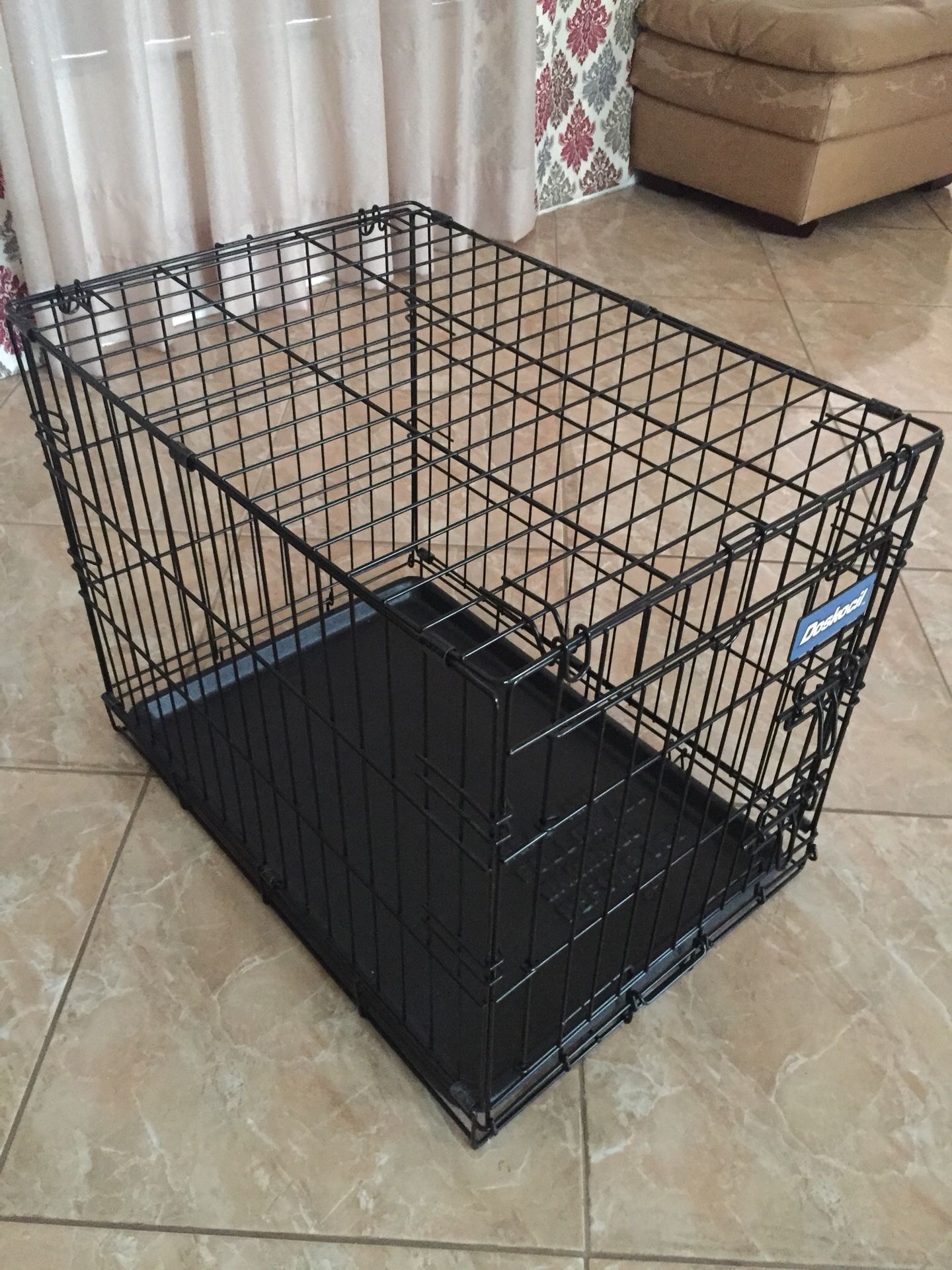24 inch Puppy/small dog crate in new condition