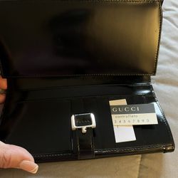 Gucci Wallet $170.