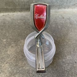 Cutlass Hood Ornament Calais Emblem