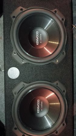 Two Kenwood 10" subwoofers with inclosure
