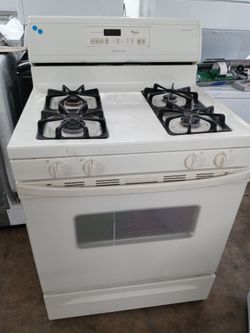 Whirlpool almond 4-burner propane-converted stove - Free delivery