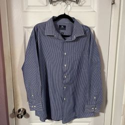 Men’s Size XL Long Sleeve Button down dress shirt.  Made of 50 % Cotton and 50% Polyester.  Brand Dockers.  Preowned Excellent Condition.  Smoke free 