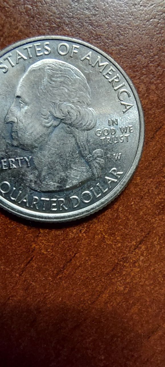 State quater W mint mark