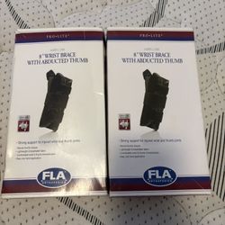 Wrist brace s/m l/xl 2 boxes black color left and right hand 