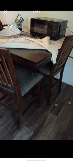 Tall dining table with six chairs