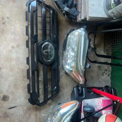 Toyota Tacoma Grille And Headlight 