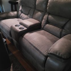 Love Seat has outlet and phone charger,  both recliner. No rips , good condition. 