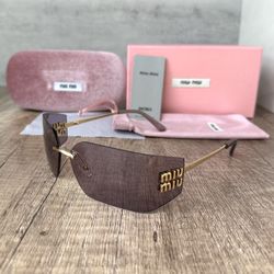 Miu Miu Sunglasses Purple Lens